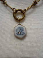 Load image into Gallery viewer, Oyster Shell with Pearl Charm on Gold Trombone Chain w/ Attached Carabiner