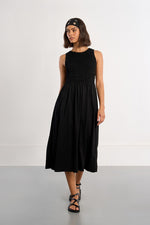 Load image into Gallery viewer, Smocked Midi Dress in Black
