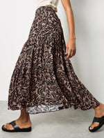 Load image into Gallery viewer, Tiered Leaf Print Maxi Skirt in Brown
