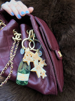 Load image into Gallery viewer, Hand-painted Champagne Bag Charm + Keychain
