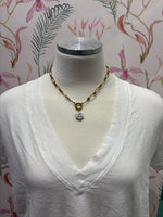 Load image into Gallery viewer, Oyster Shell with Pearl Charm on Gold Trombone Chain w/ Attached Carabiner
