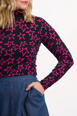 Load image into Gallery viewer, Annika Turtleneck Jersey Top in Black/Pink Doodle Stars

