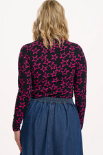 Load image into Gallery viewer, Annika Turtleneck Jersey Top in Black/Pink Doodle Stars
