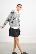 Load image into Gallery viewer, Sequin Bow Cardigan Sweater in Ash Dark Grey
